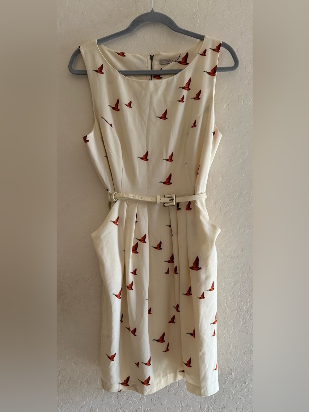 Darling, large, sleeveless mini dress with duck pattern and a matching belt